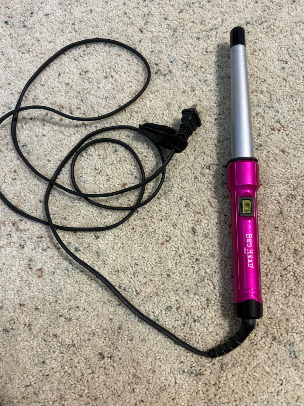 Bed Head pink curling wand. Works great.